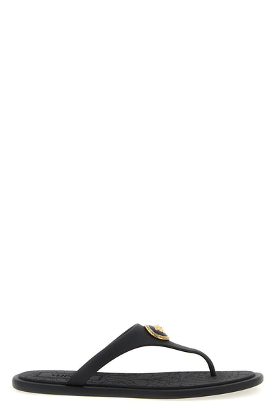 alia flat sandals in rubber