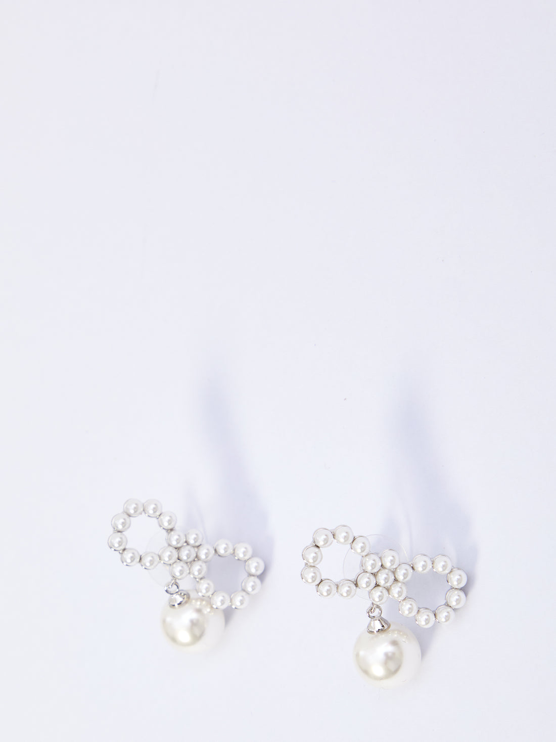 SELF PORTRAIT OS pearl bow earrings