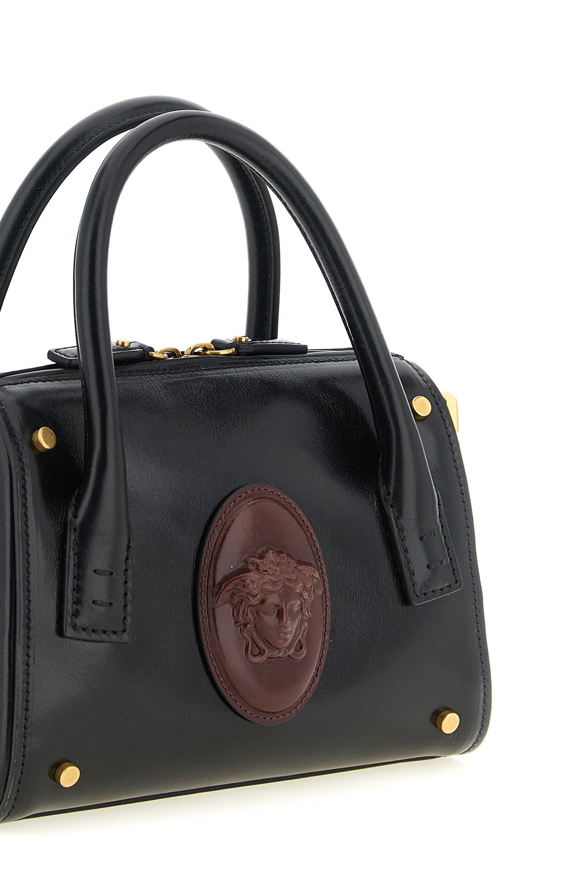 the versace roomy small handbag is made of fine smooth calf leather