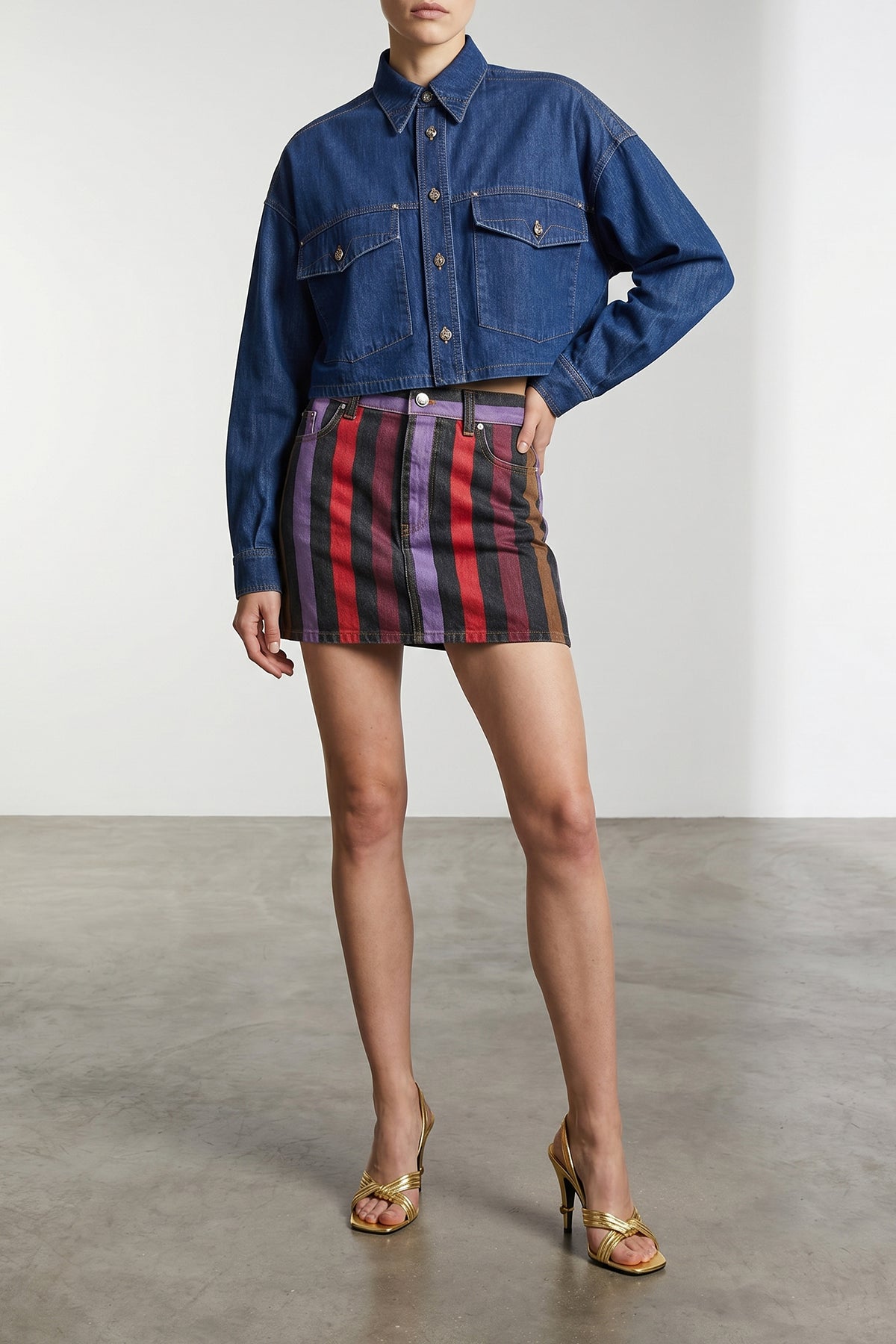 the versace shirt redefines casual wear through a structured crop silhouette