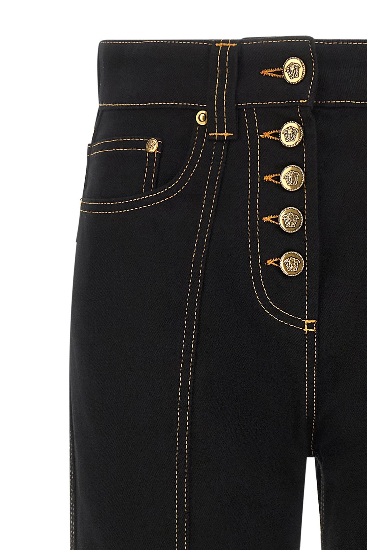 versace high-waisted jeans redefine casual aesthetics through rigorous tailored