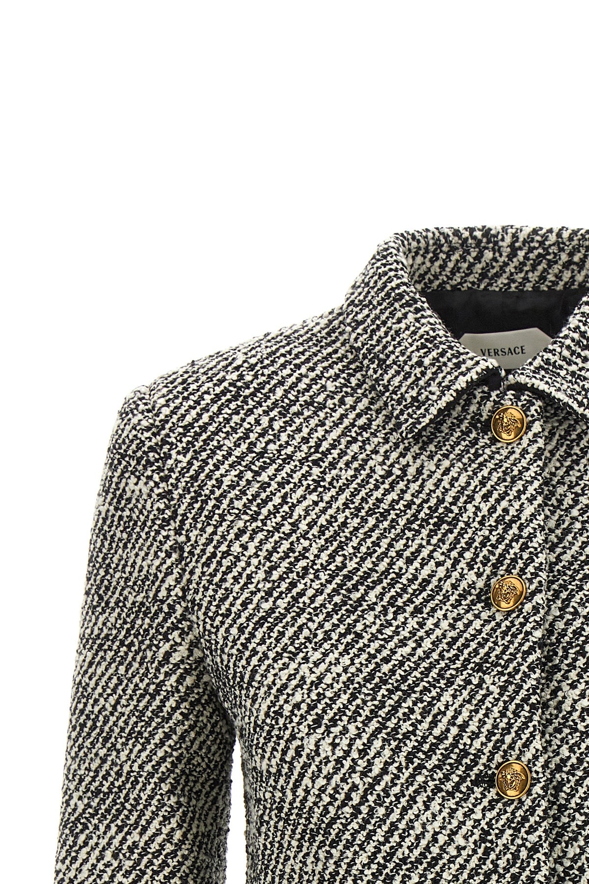 the versace cropped jacket defines a new proportion through a structured blouson
