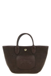 the longchamp xs le pliage handbag defines a compact basket silhouette