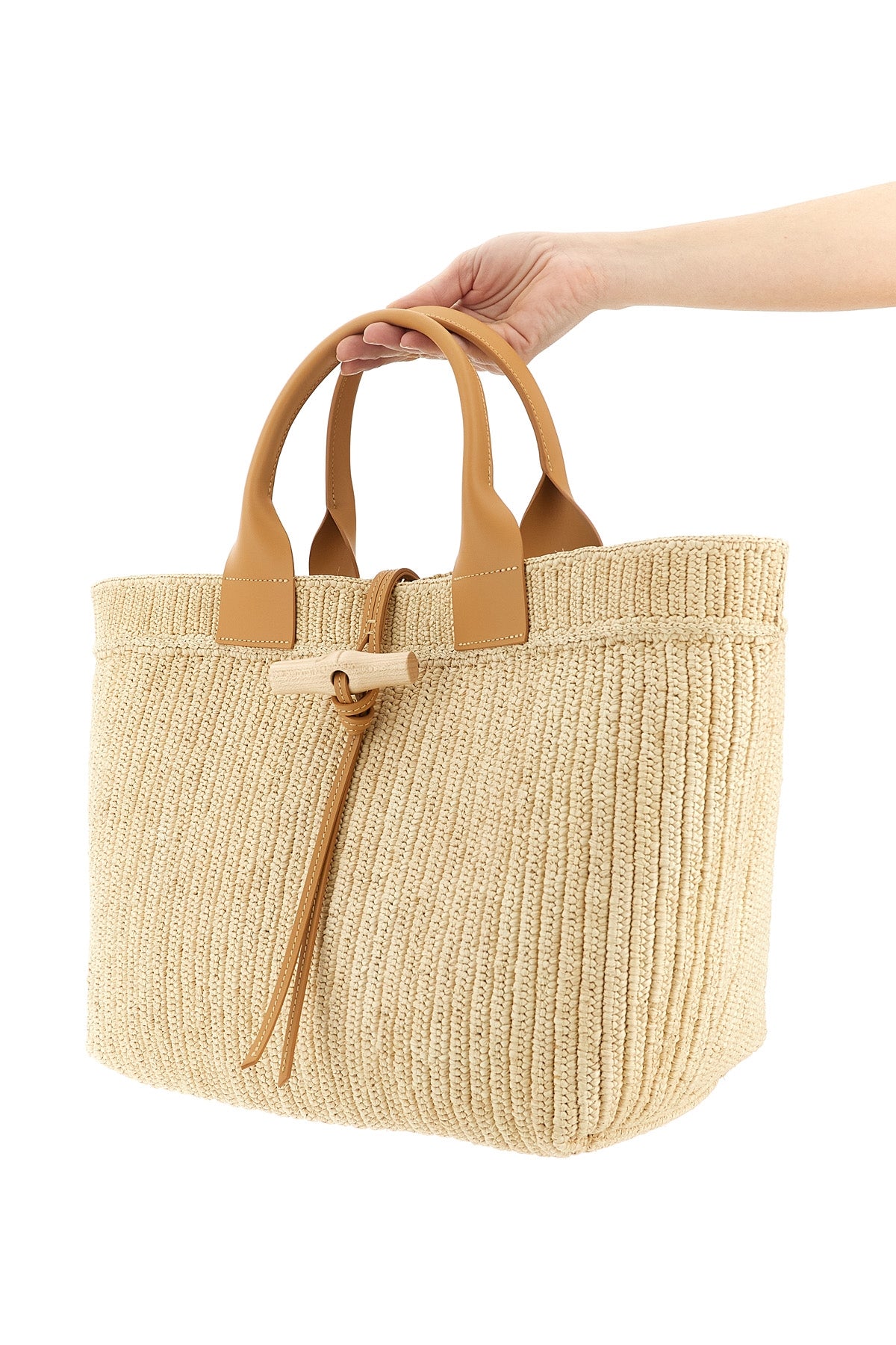 l le roseau shopping bag made from a single hand-woven raffia panel