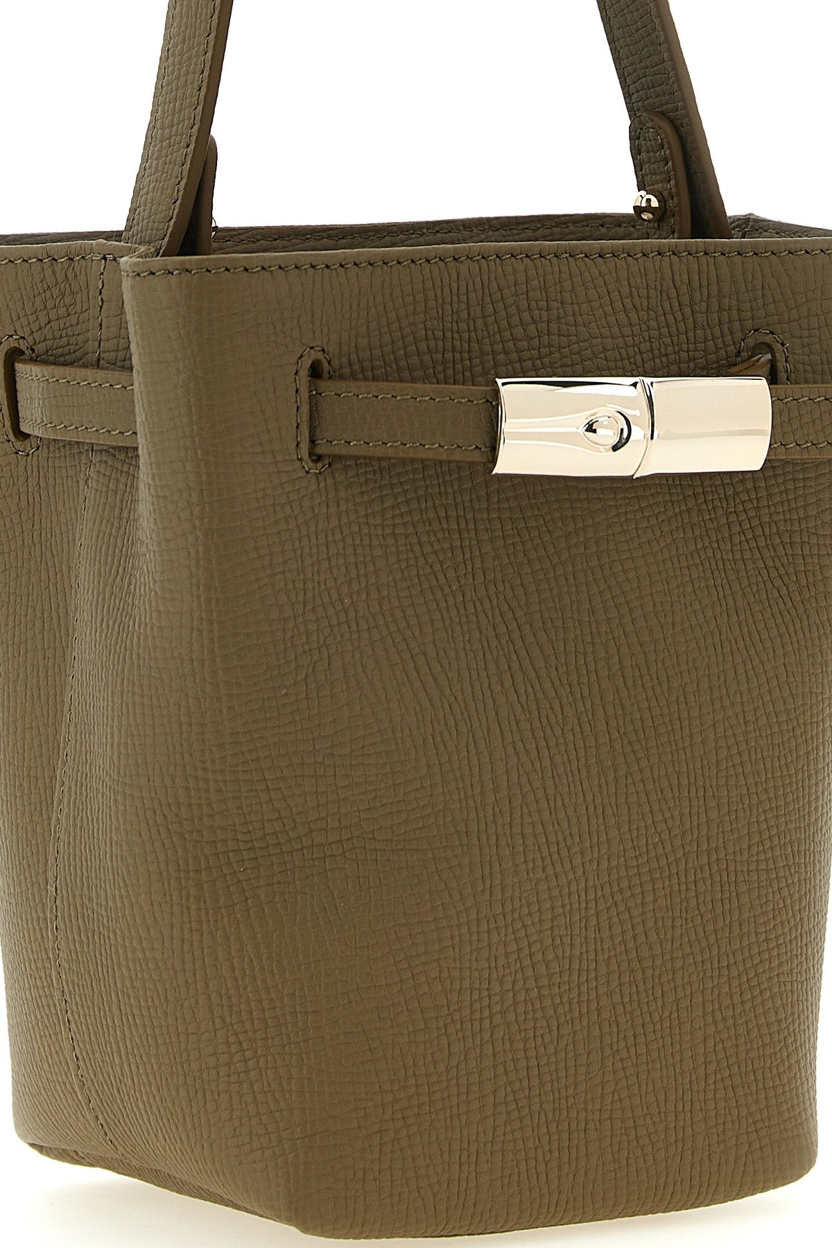 the longchamp le smart flow bucket bag stands out for its structured and compact