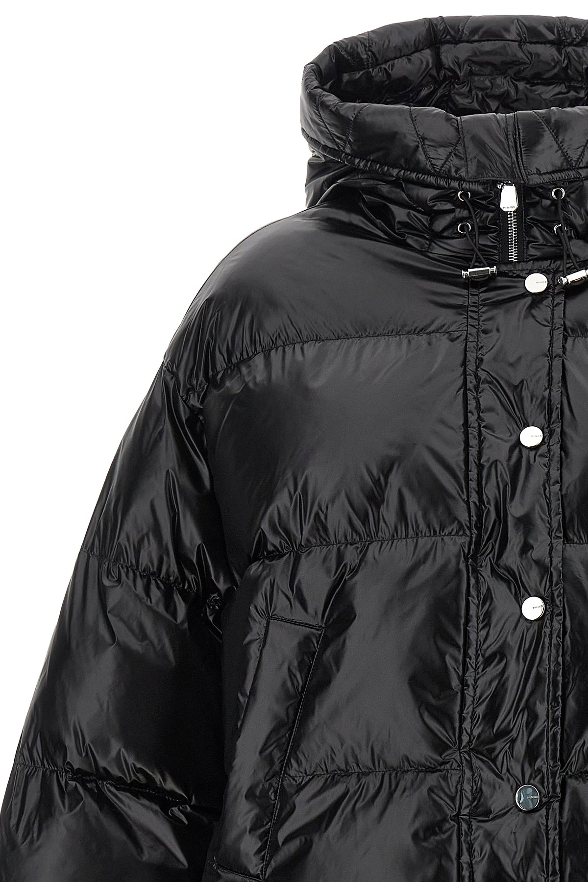 the impasto pinko down jacket redefines winter volumes through a short-cut sil