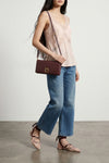 medium love click soft horizontal clutch bag in soft padded leather