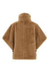 the pinko cape redefines the volumes of outerwear through an enveloping and stru
