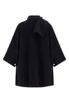 the pinko caban redefines the volumes of the outerwear through a cape silhouette