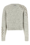 the pinko sweater has a cropped silhouette made of a precious alpaca and wool bl