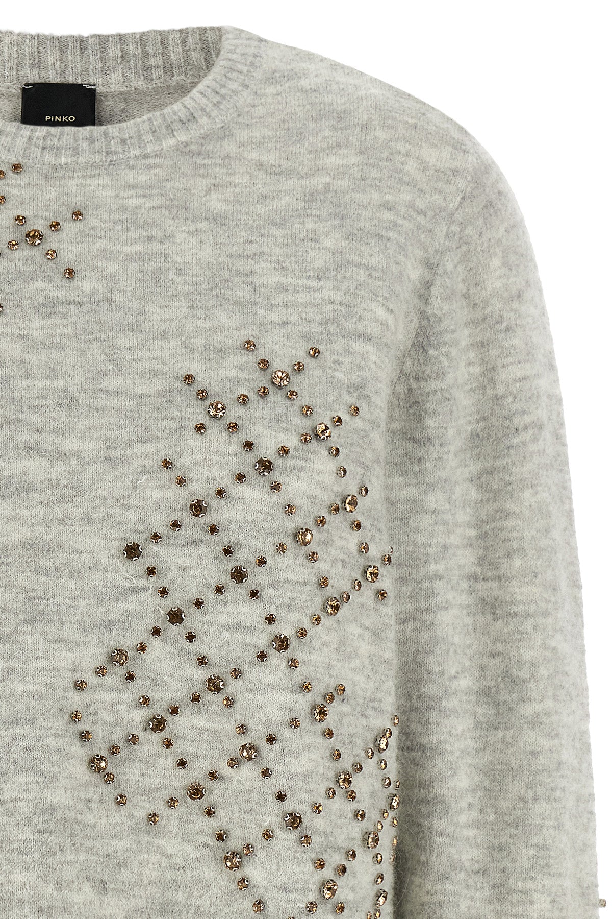 the pinko sweater has a cropped silhouette made of a precious alpaca and wool bl