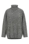 the pinko turtleneck is distinguished by a relaxed silhouette