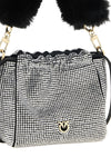 the bucket shoulder bag redefines evening elegance through a soft silhouette ent