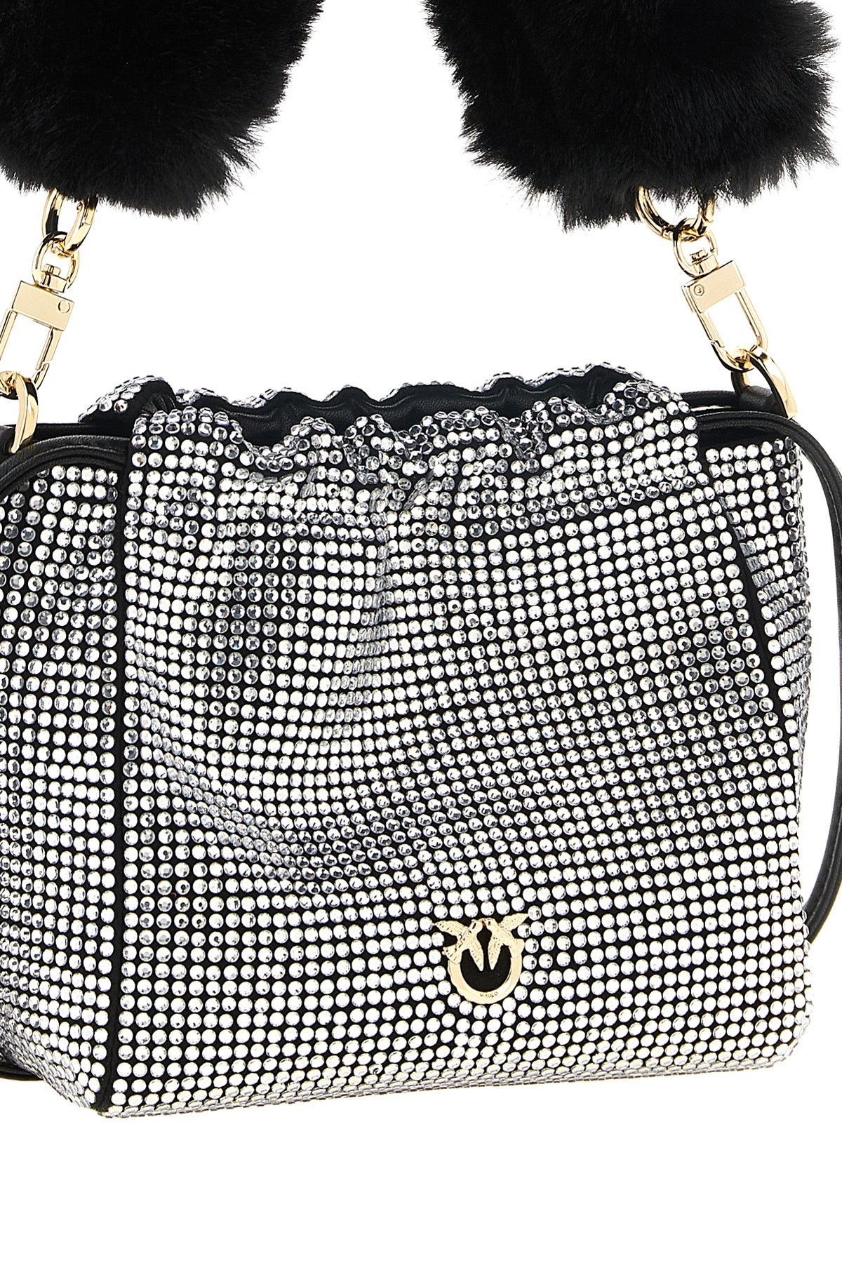the bucket shoulder bag redefines evening elegance through a soft silhouette ent