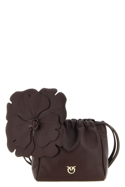 the pinko flower pouch stands out for a soft and curled silhouette