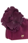 the pinko flower pouch redefines the volumes of leather goods through a soft a