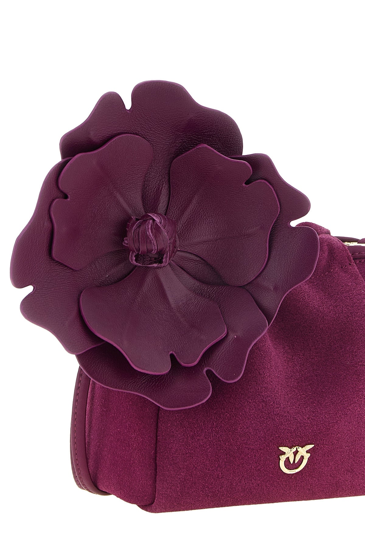 the pinko flower pouch redefines the volumes of leather goods through a soft a