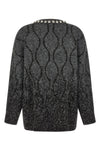 the pinko renault sweater redefines knitwear codes through oversized volumes a