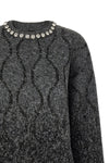the pinko renault sweater redefines knitwear codes through oversized volumes a