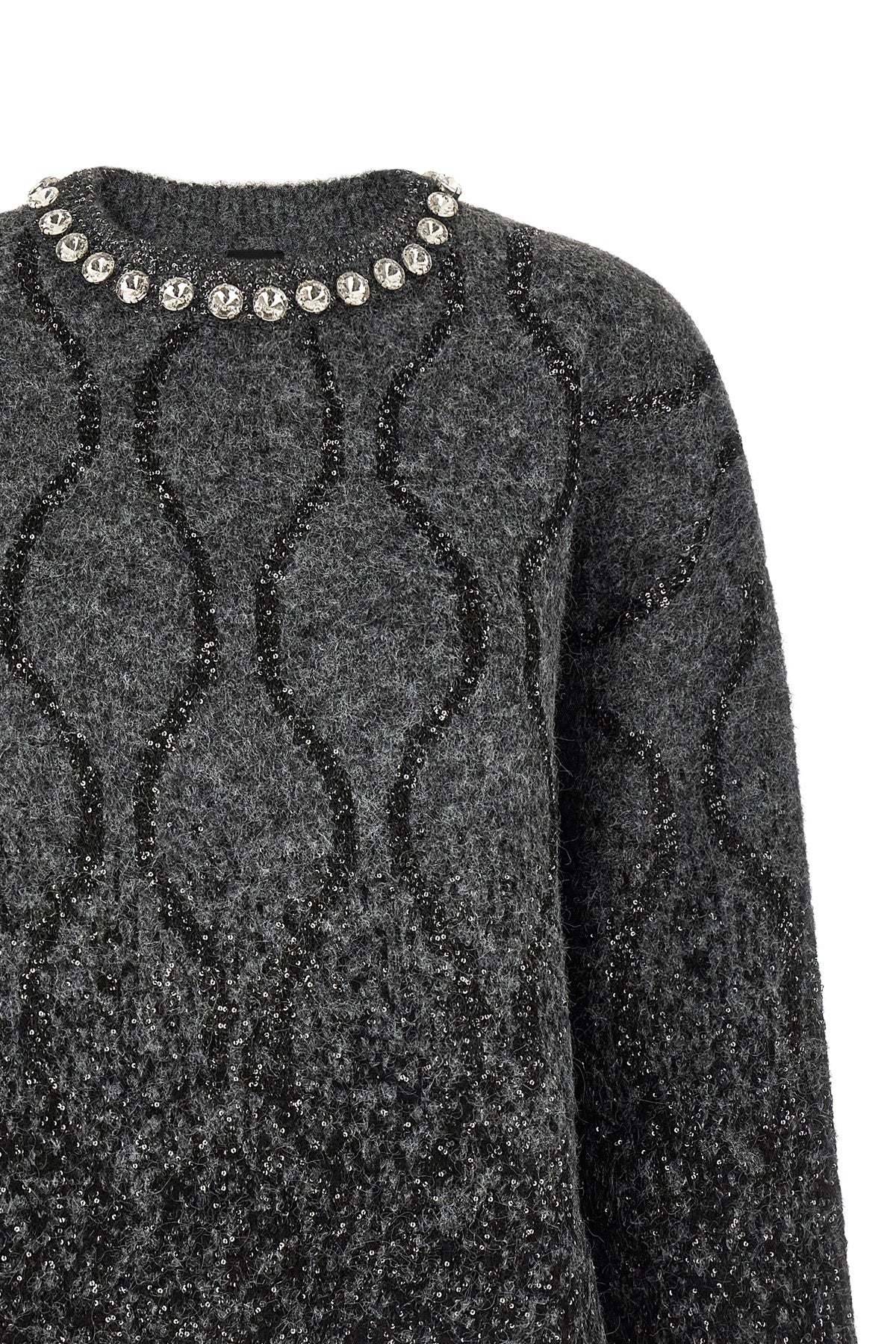 the pinko renault sweater redefines knitwear codes through oversized volumes a