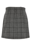 the tela gaby skirt redefines the codes of classic tailoring through shortened p
