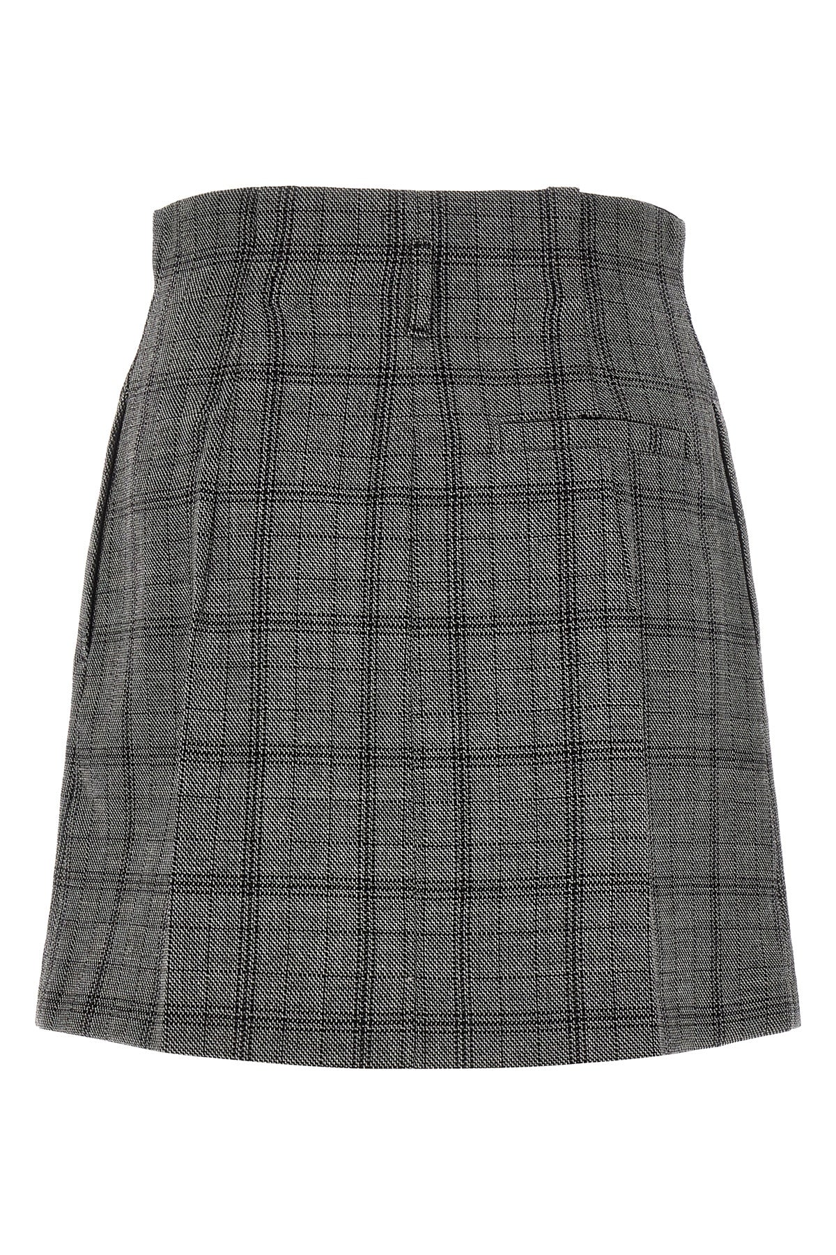 the tela gaby skirt redefines the codes of classic tailoring through shortened p