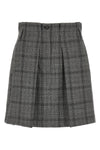 the tela gaby skirt redefines the codes of classic tailoring through shortened p