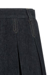 the tela charlotte j skirt redefines the codes of casual dress through a rigor