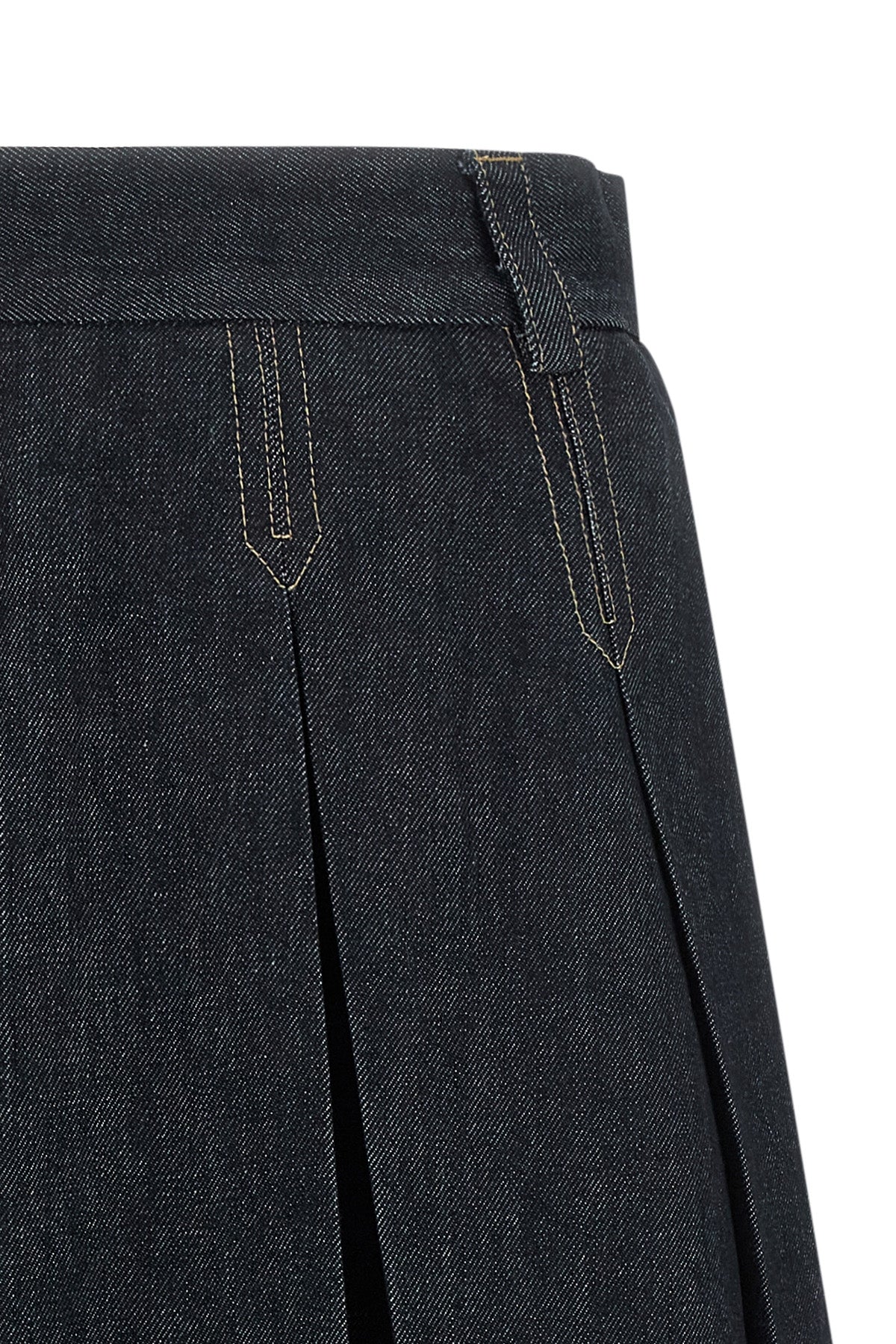 the tela charlotte j skirt redefines the codes of casual dress through a rigor