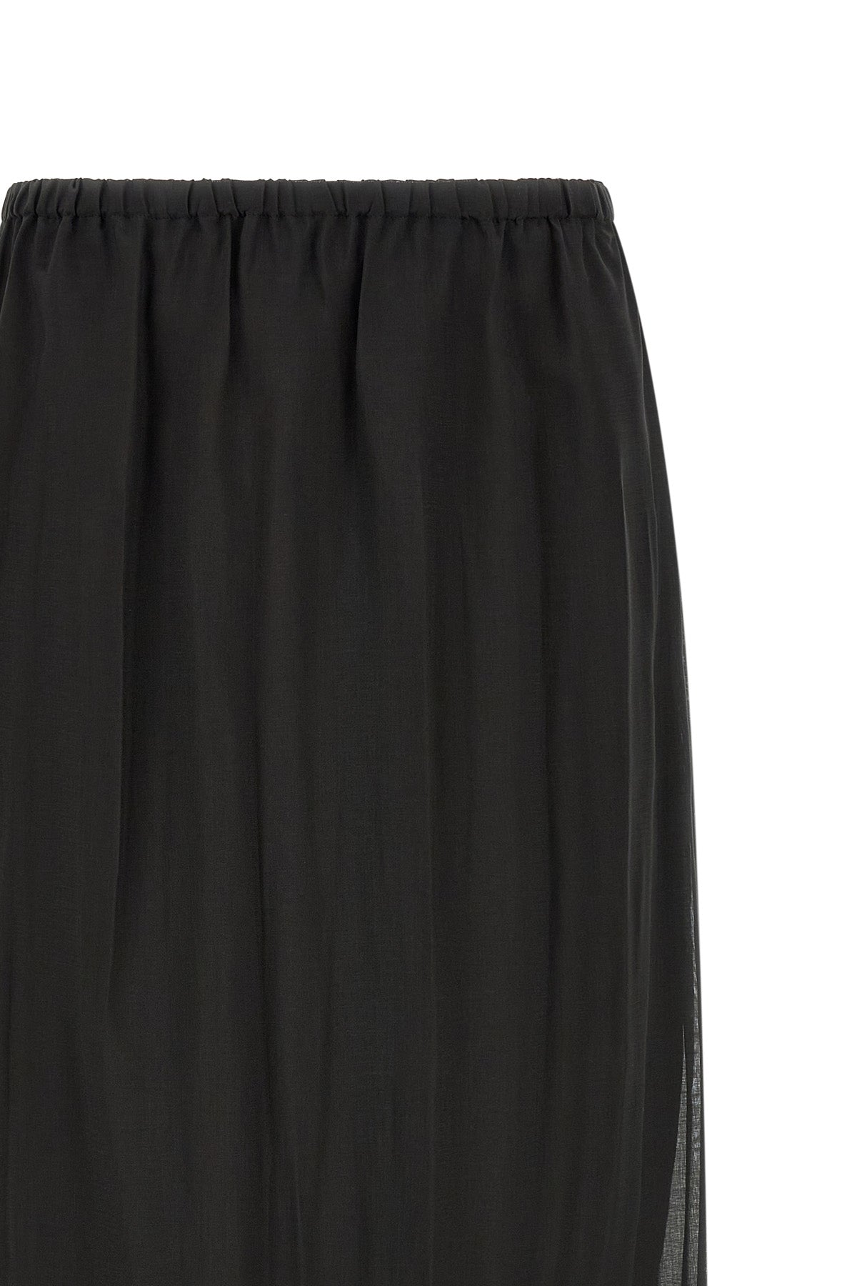the tela ophelia skirt redefines volumes through a sophisticated play of overlap