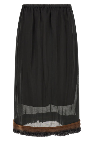 the tela ophelia skirt redefines volumes through a sophisticated play of overlap