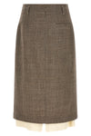 the midi skirt tela redefines the codes of contemporary tailoring through a play