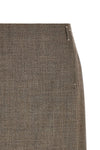 the midi skirt tela redefines the codes of contemporary tailoring through a play