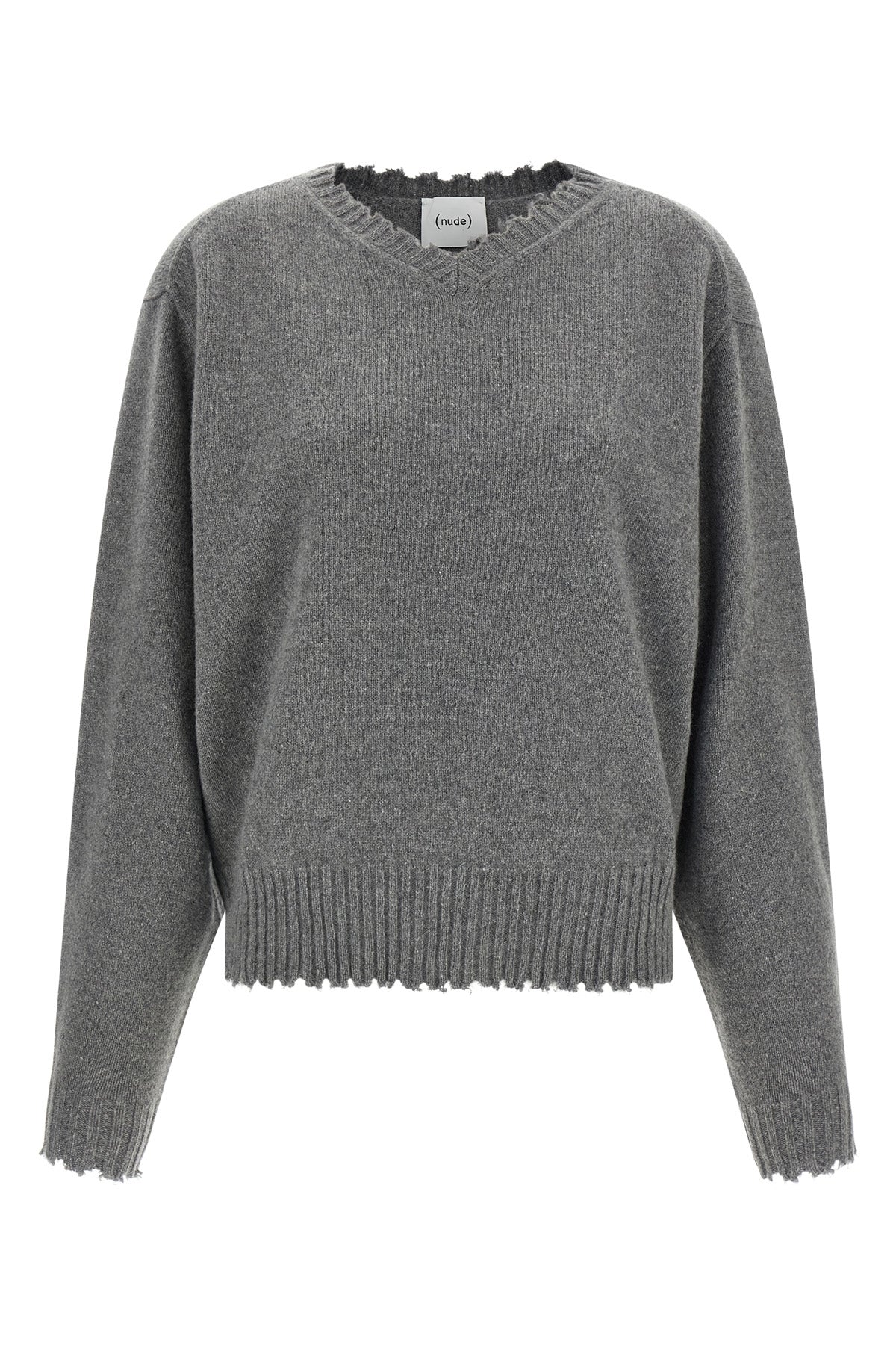 the nude v-neck sweater redefines knitwear codes through a deconstructed aesthet