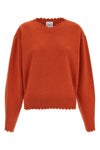 the v-neck sweater nude stands out for its pure cashmere construction that combi