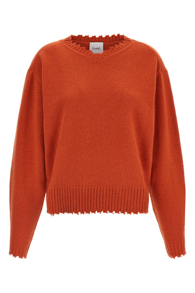 the v-neck sweater nude stands out for its pure cashmere construction that combi