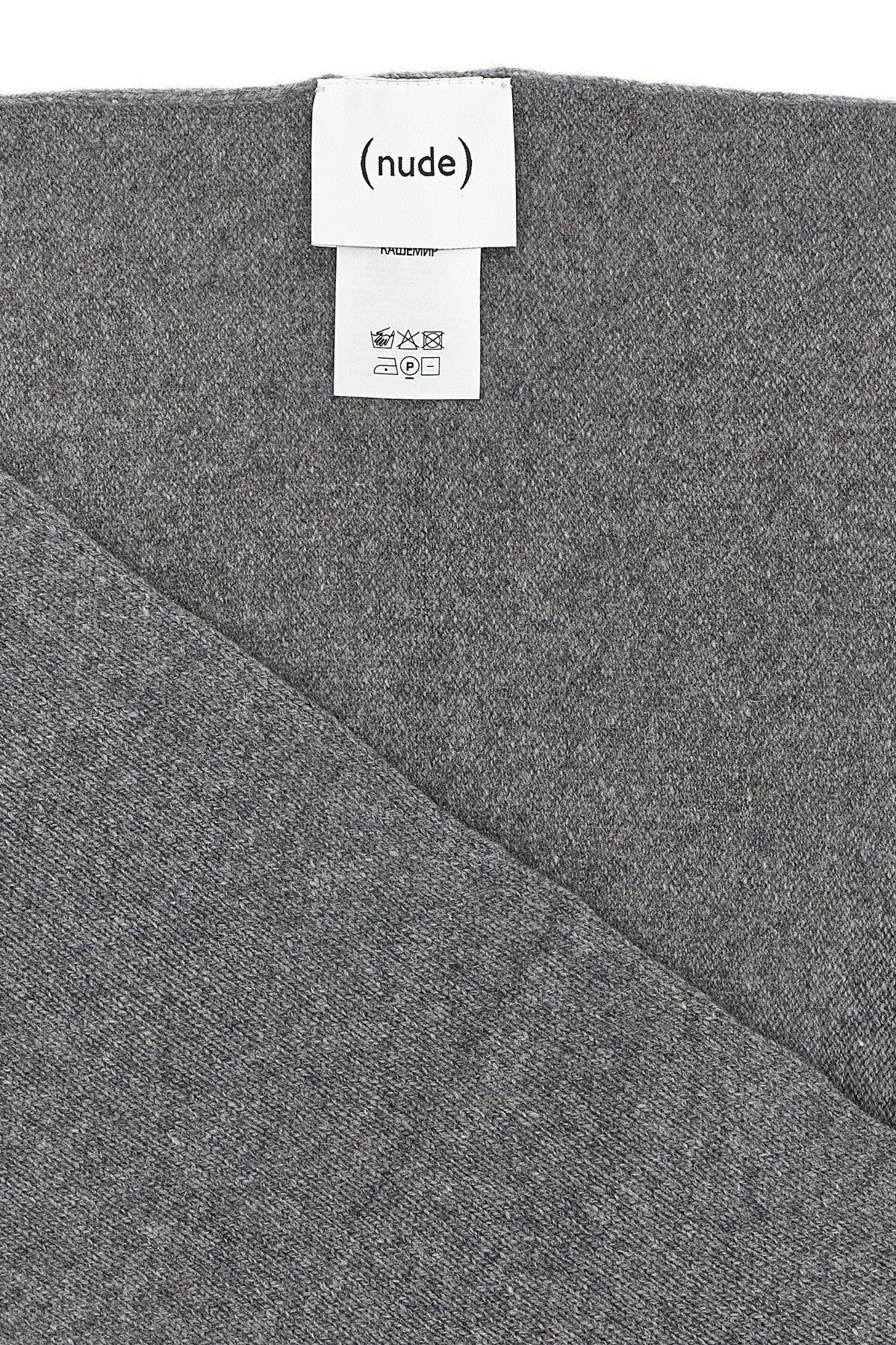 the nude pure cashmere scarf defines minimalist luxury through its essential con