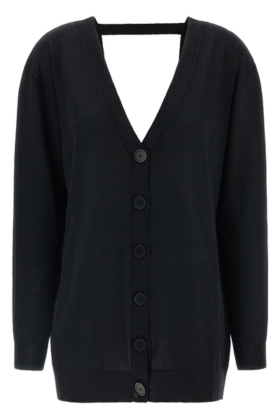 the pure wool cardigan nude redefines the codes of knitwear through a fluid and