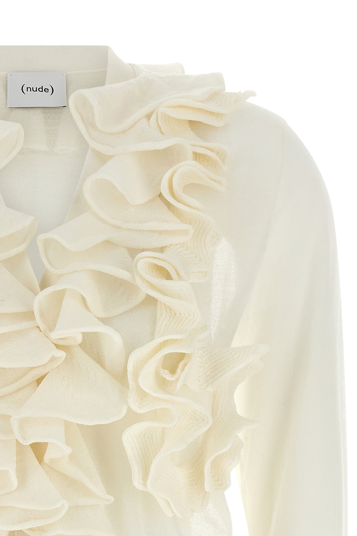 the nude cardigan is distinguished by a fine knit construction
