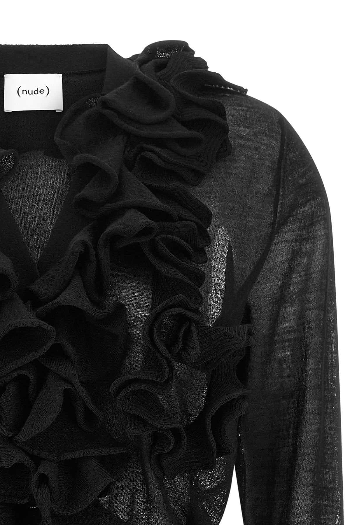 the nude cardigan defines a new interpretation of knitwear through a constructio