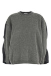 the nude crew neck sweater redefines contemporary knitwear through an oversized