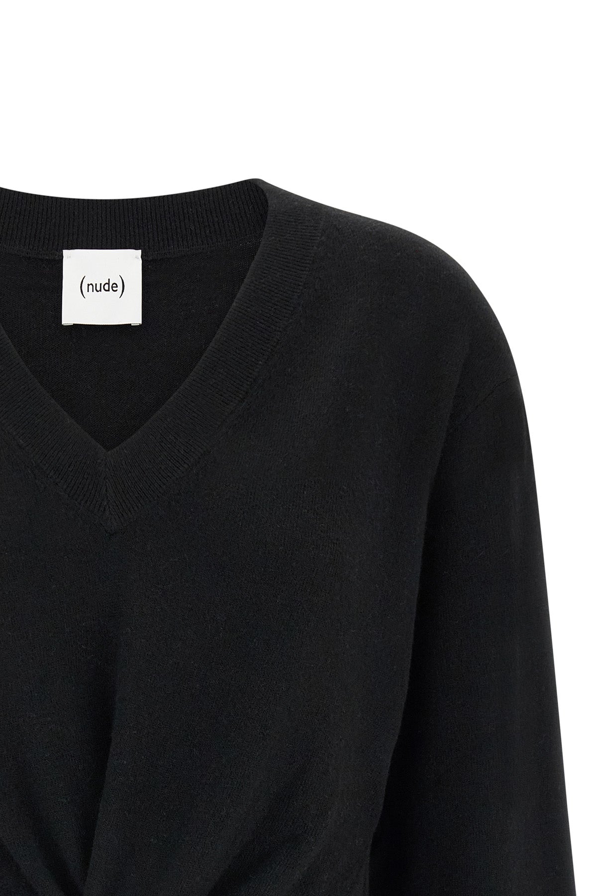the nude v-neck sweater redefines the volumes of classic knitwear through a scul