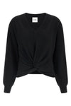 the nude v-neck sweater redefines the volumes of classic knitwear through a scul