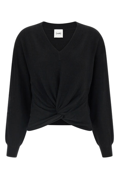 the nude v-neck sweater redefines the volumes of classic knitwear through a scul
