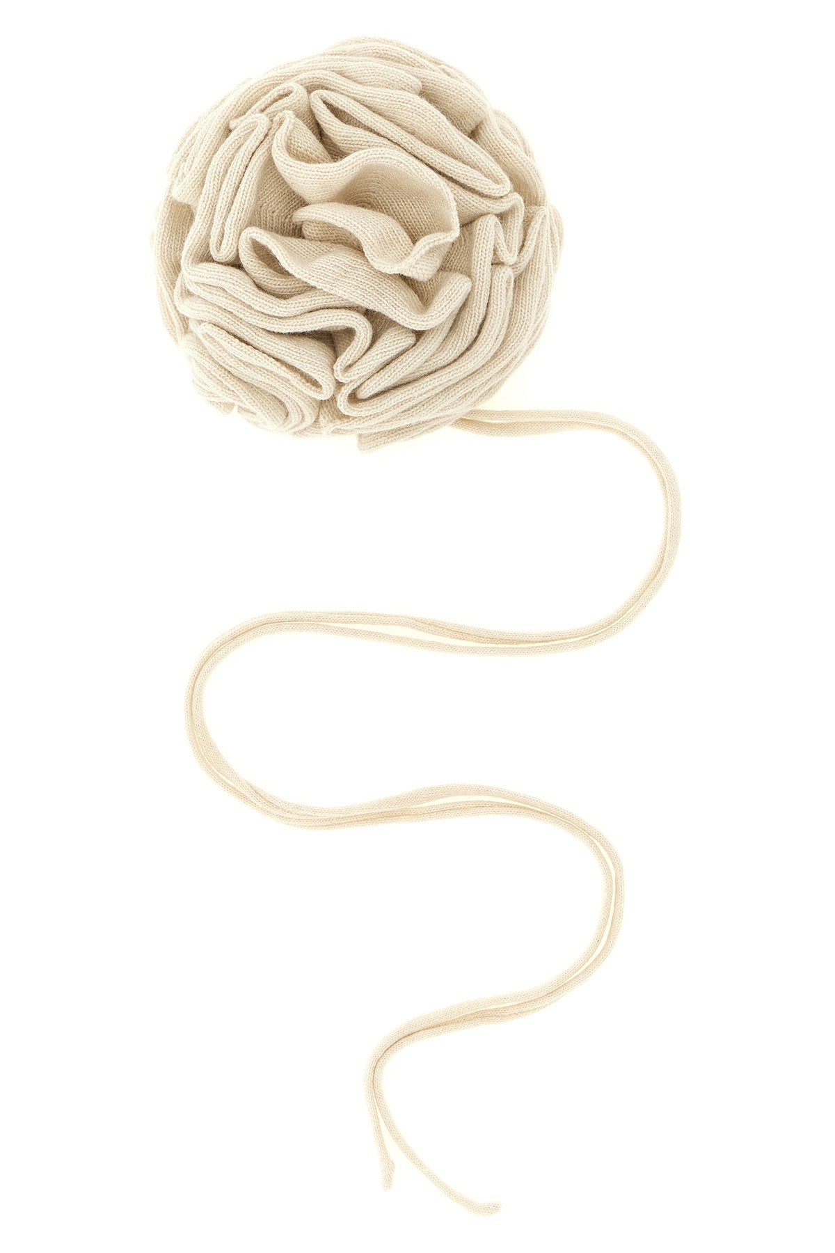 the floral accessory (nude) is distinguished by a sculptural construction in sof