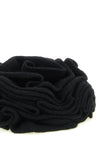 the accessory nude is distinguished by a sculptural knitting that recreates a de
