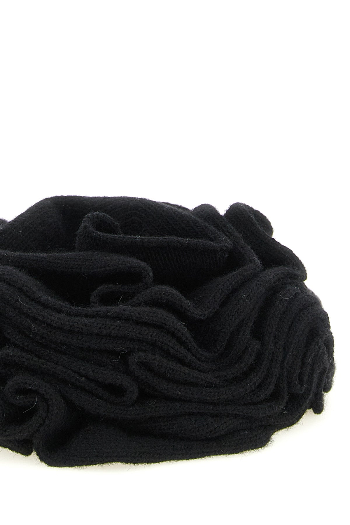 the accessory nude is distinguished by a sculptural knitting that recreates a de