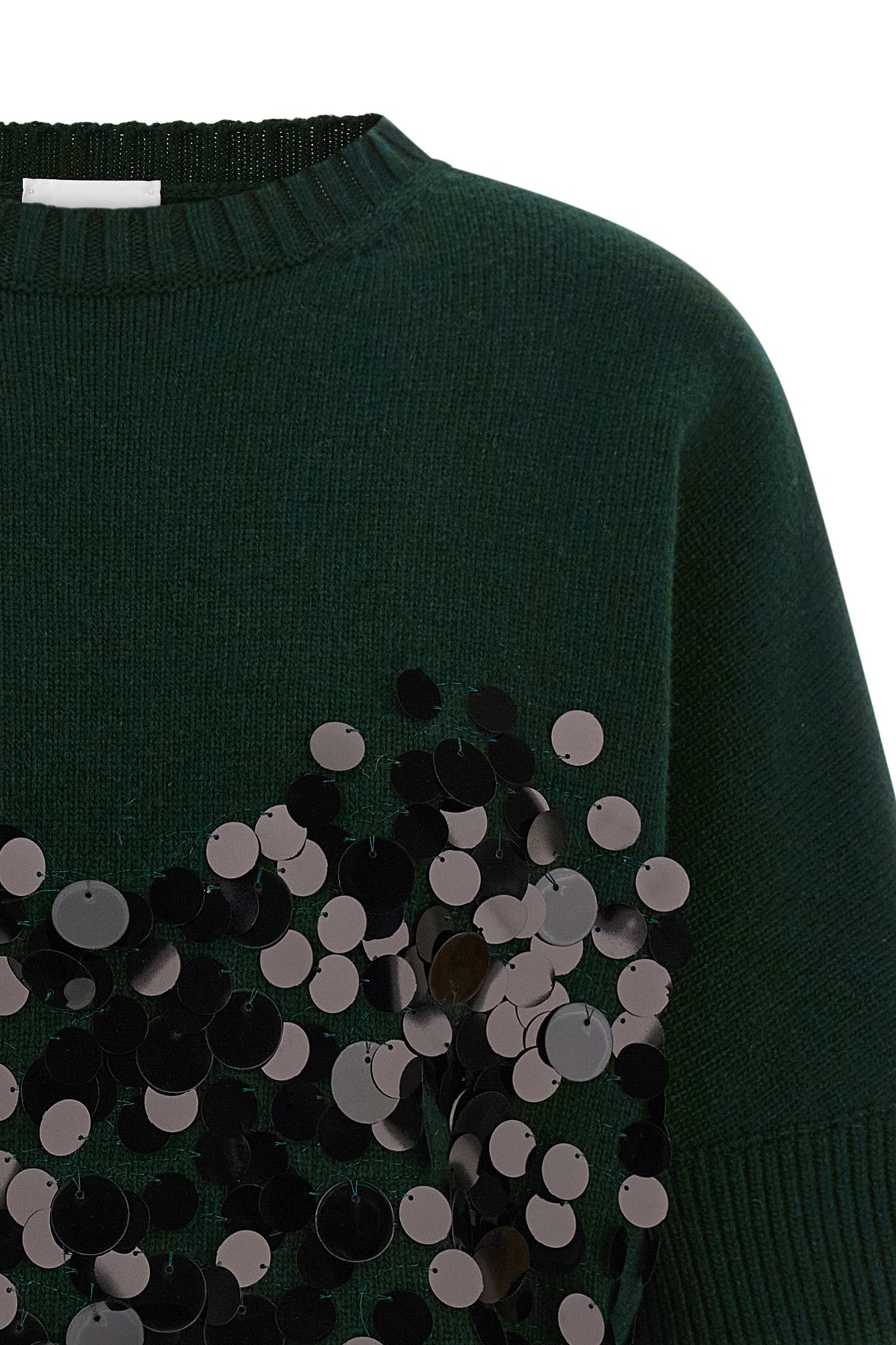 the nude short-sleeved shirt redefines the codes of contemporary knitwear throug