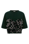 the nude short-sleeved shirt redefines the codes of contemporary knitwear throug