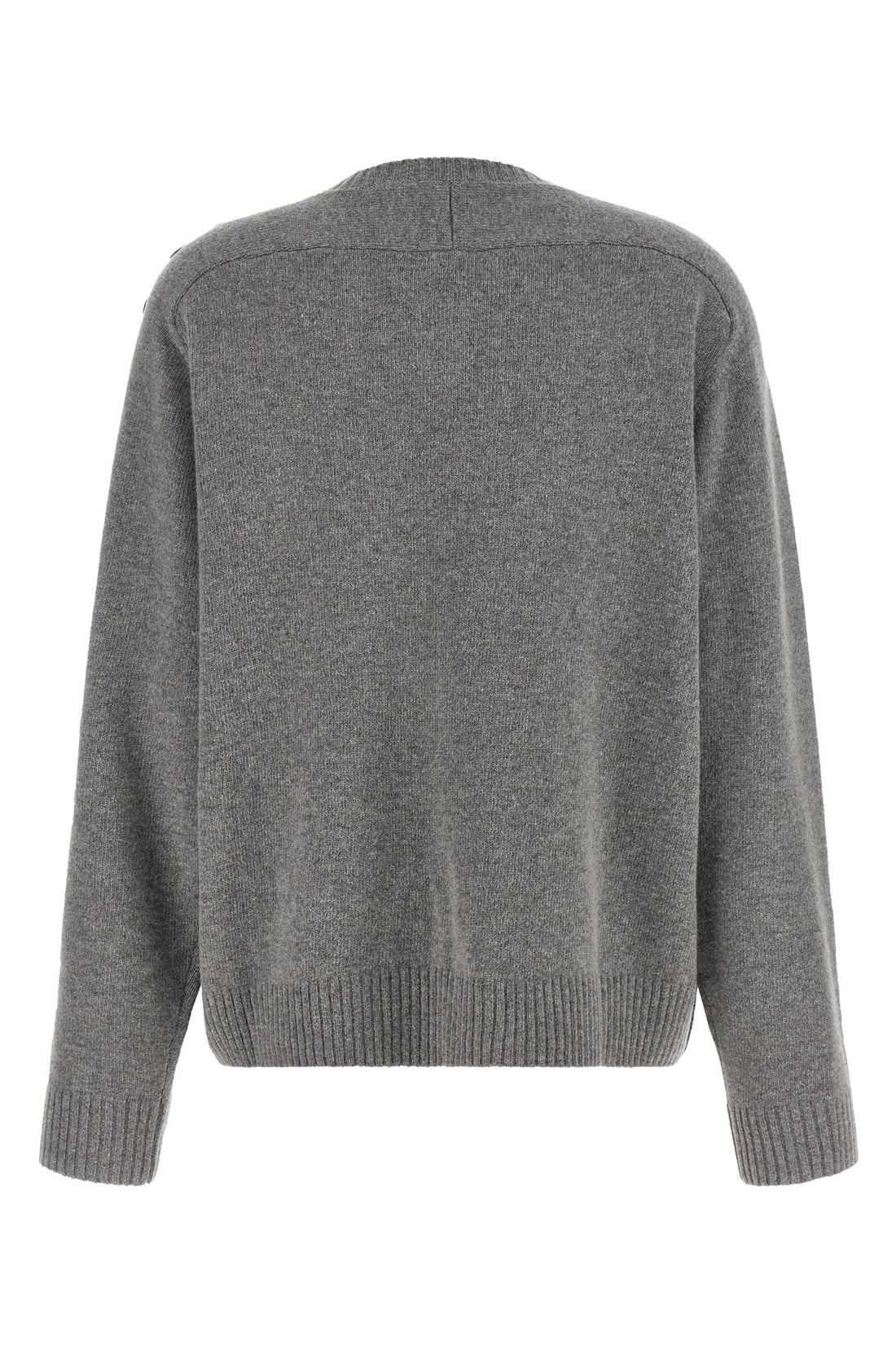 NUDE M the nude knit redefines the elegance of knitwear through a bold material contras
